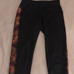 Black capris with side detailing